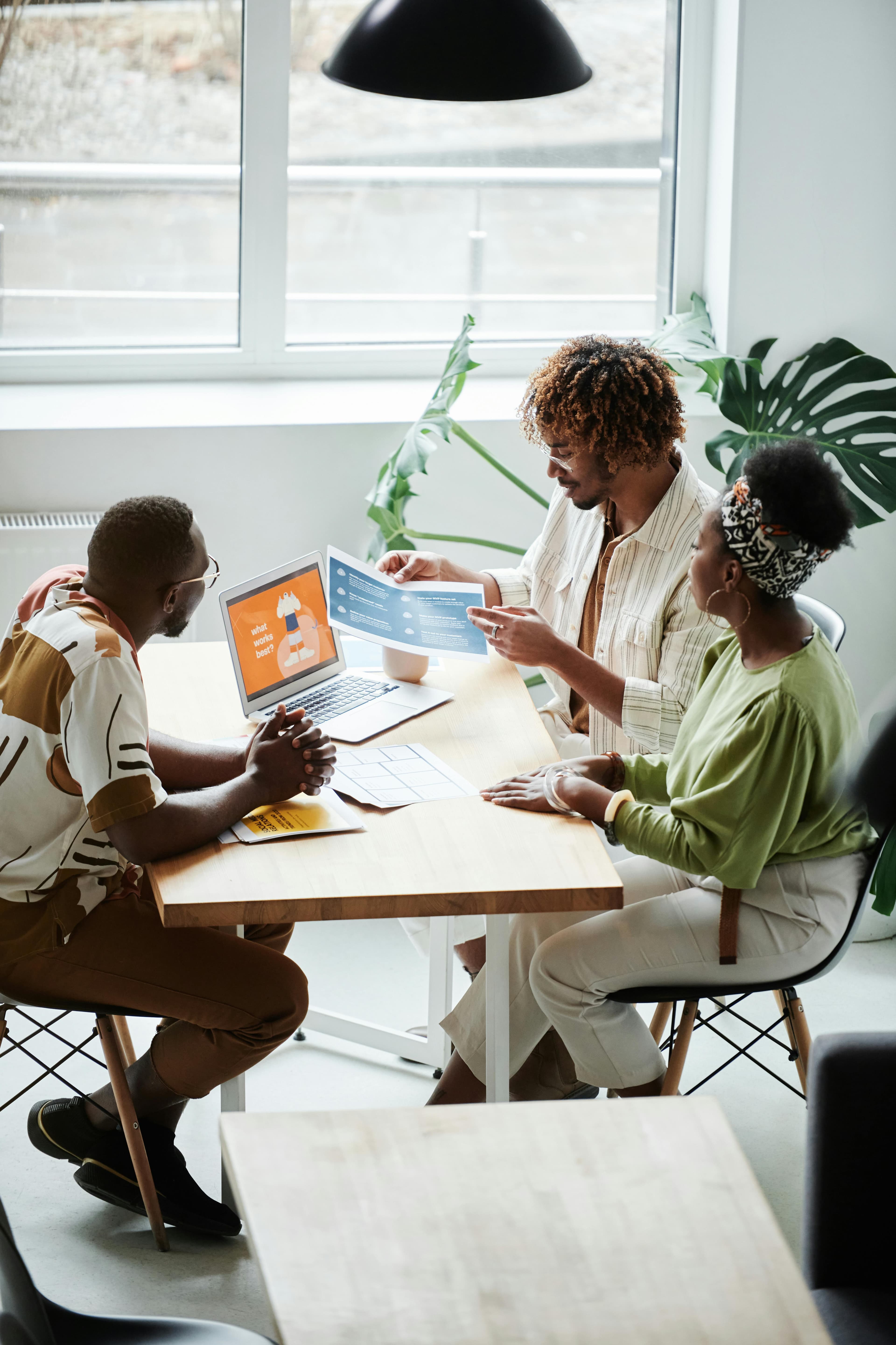 Contact us background image - showing people discussing on a table